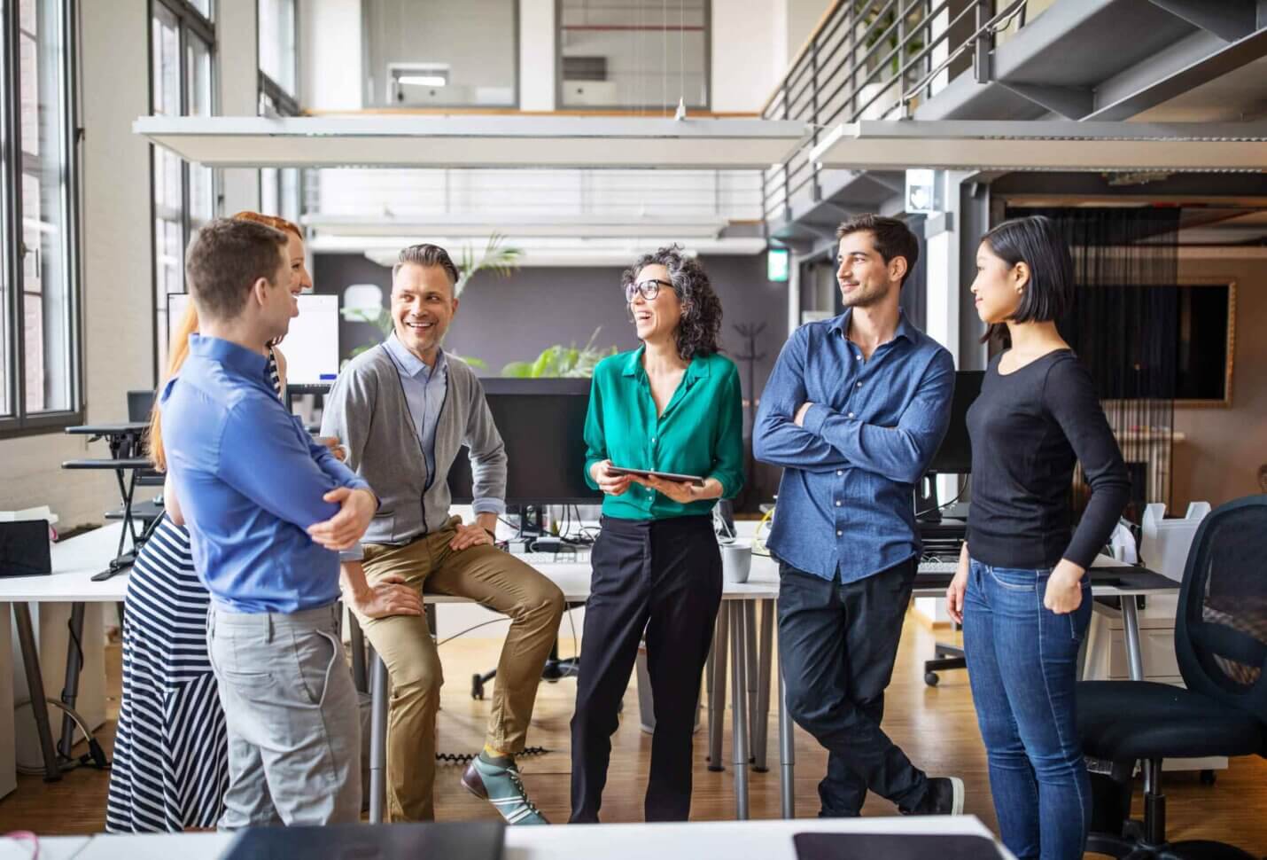 Six people discussing with each other
