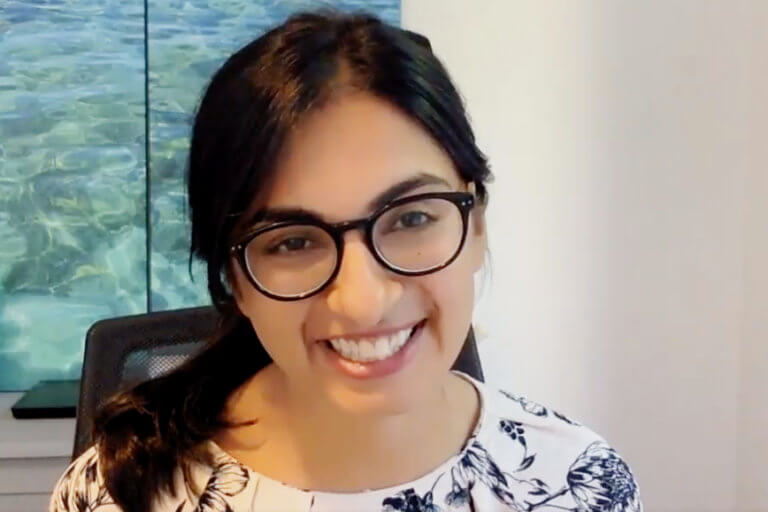 Woman wearing glasses smiling
