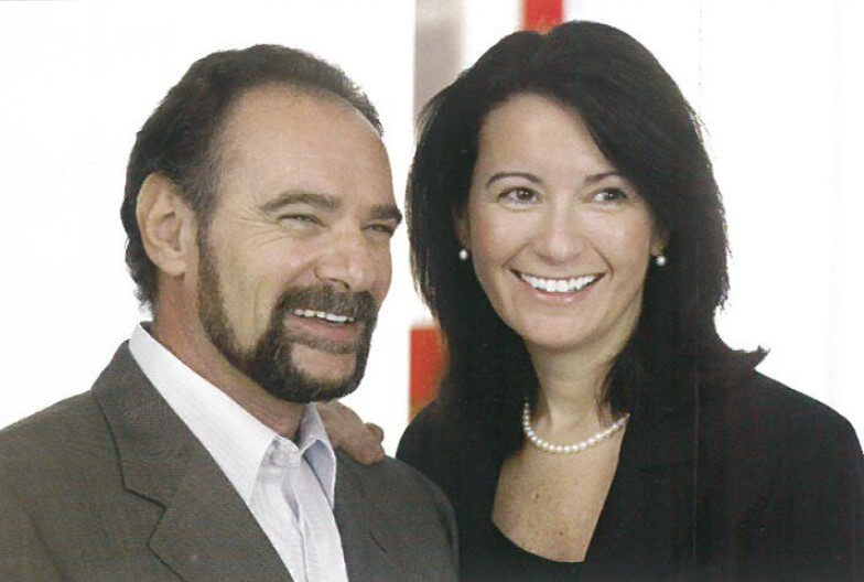 A close-up of two people standing together.