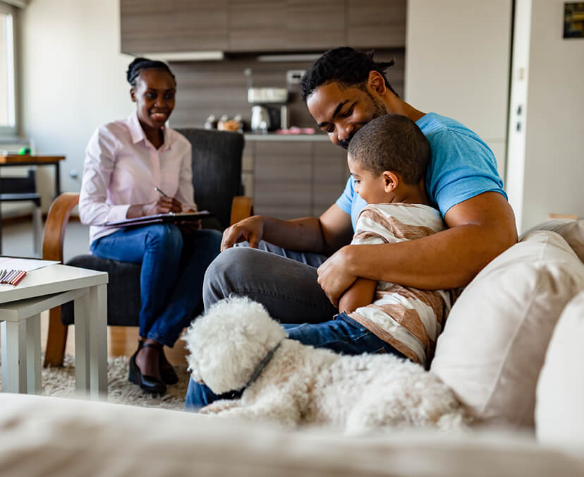 Family with dad and child on couch
