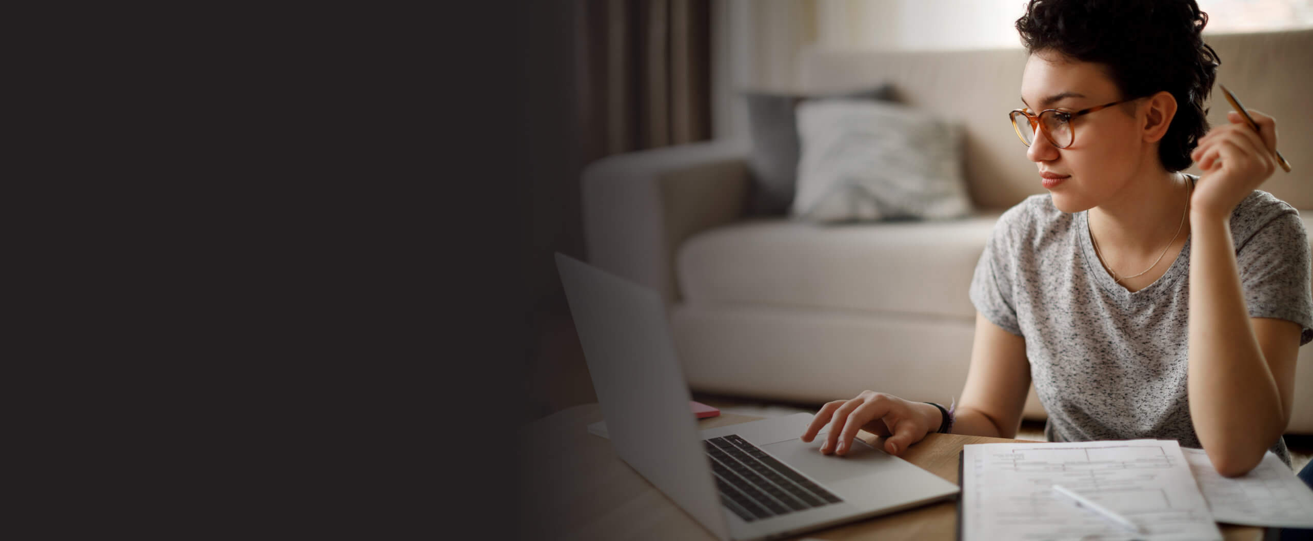 Woman at computer studying criminology