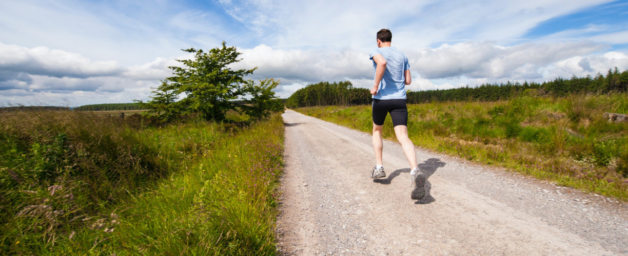 Person trail running outside