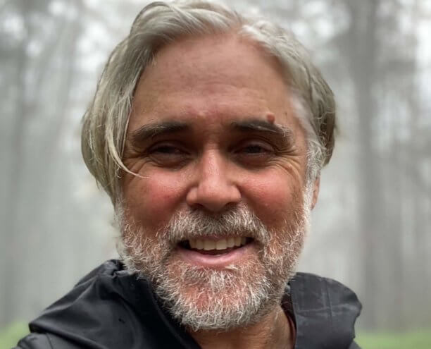 Scott_Wanchap_profile photo Profile picture of a man in a forest.