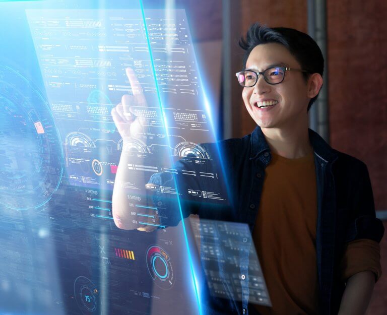 A man interacting with a virtual screen.