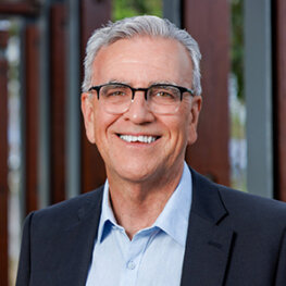 Dr Mark Setch Portrait and professional headshot of man in suit. Dr Mark Setch