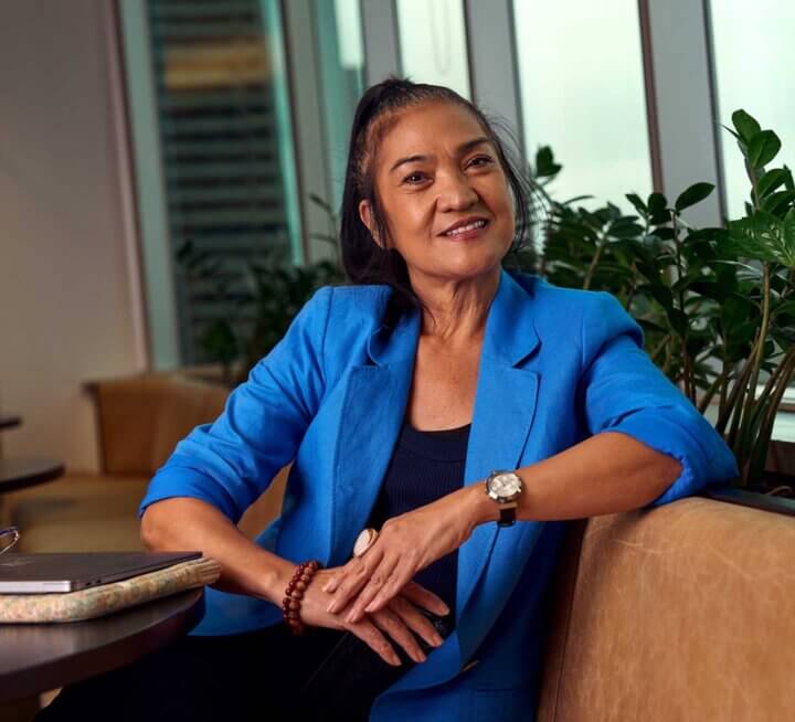 Female social work student Maria sitting at ACAP Sydney campus - close up profile shot