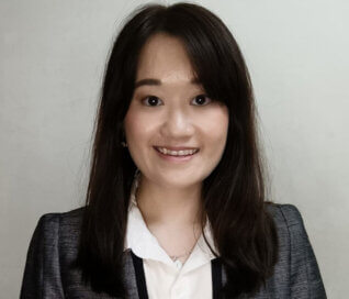 A portrait image of ACAP Education employee Katherine Karmelita