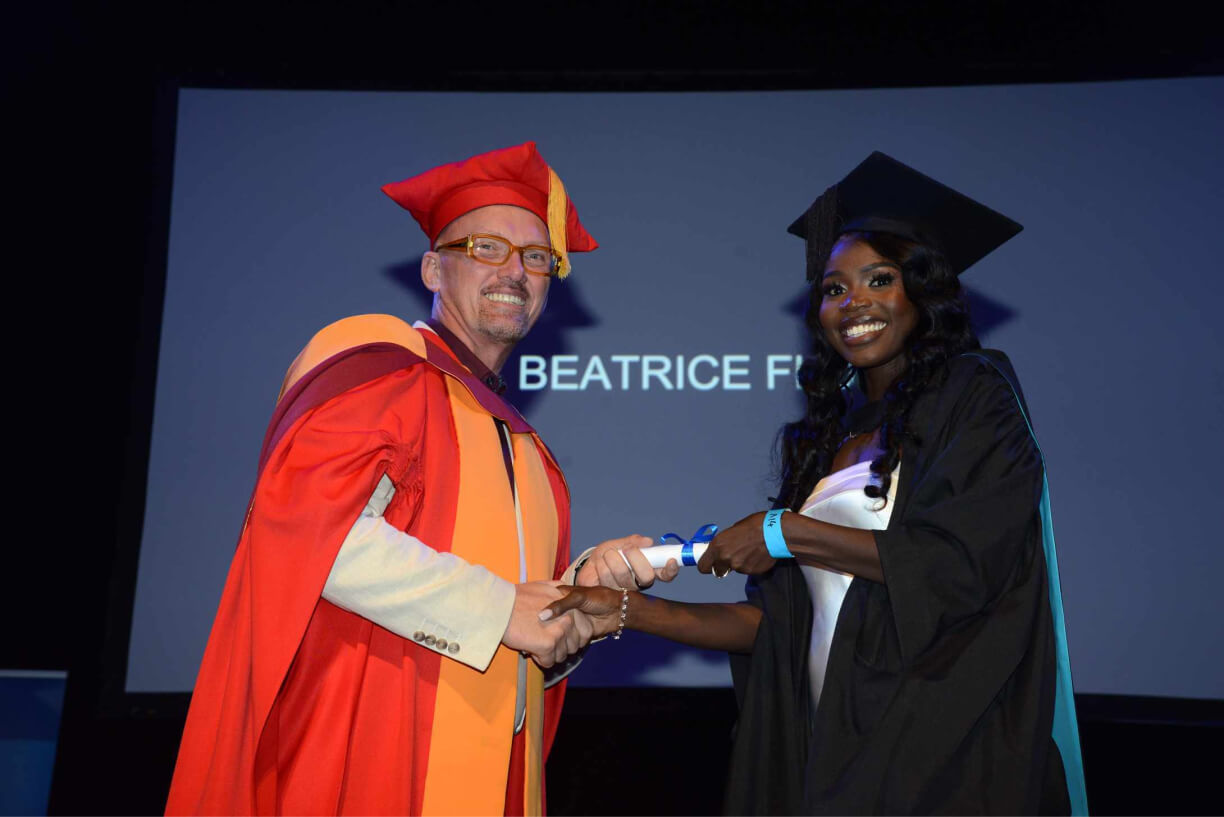 Beatrice Waran and Christopher Klopper Beatrice Waran, ACAP Valedictorian with Chris Klopper, ACAP Dean