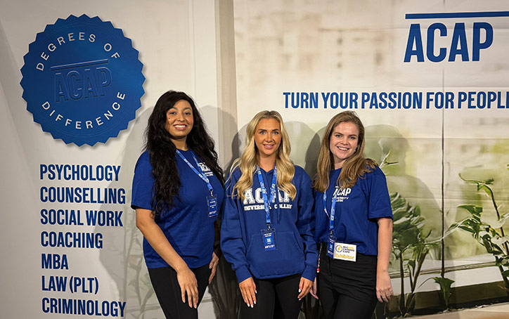 Three course advisors standing at the ACAP University College booth of the Sydney HSC & Careers Expo (724x454)