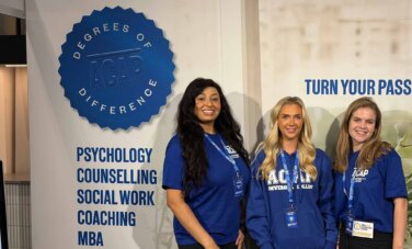 Three course advisors standing at the ACAP University College booth of the Sydney HSC & Careers Expo (2880x1188)