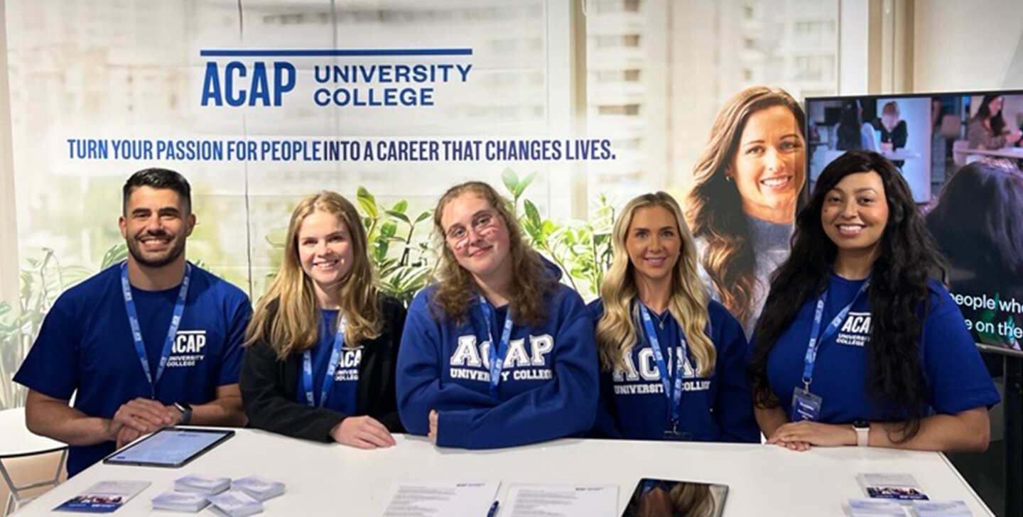 Five ACAP University College course advisors standing at a booth at the Sydney HSC and Careers Expo (2880x1188)